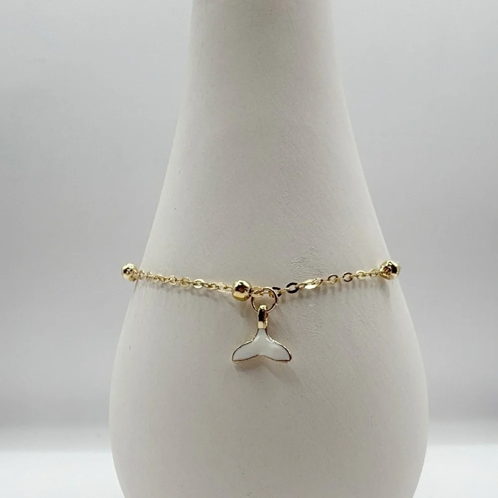 Gold Beaded Bracelet With Whale Tail Charm